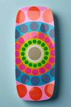 A large rectangular serving platter with brightly colored dot pattern.
