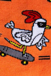 Chicken on a skateboard with a red hat on an orange background