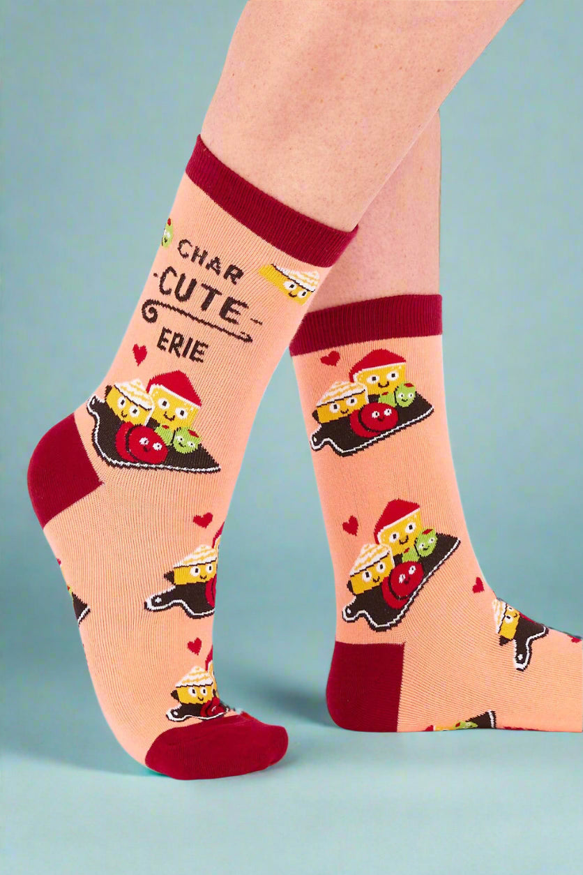 Socks with cartoon school buses and text on a white background