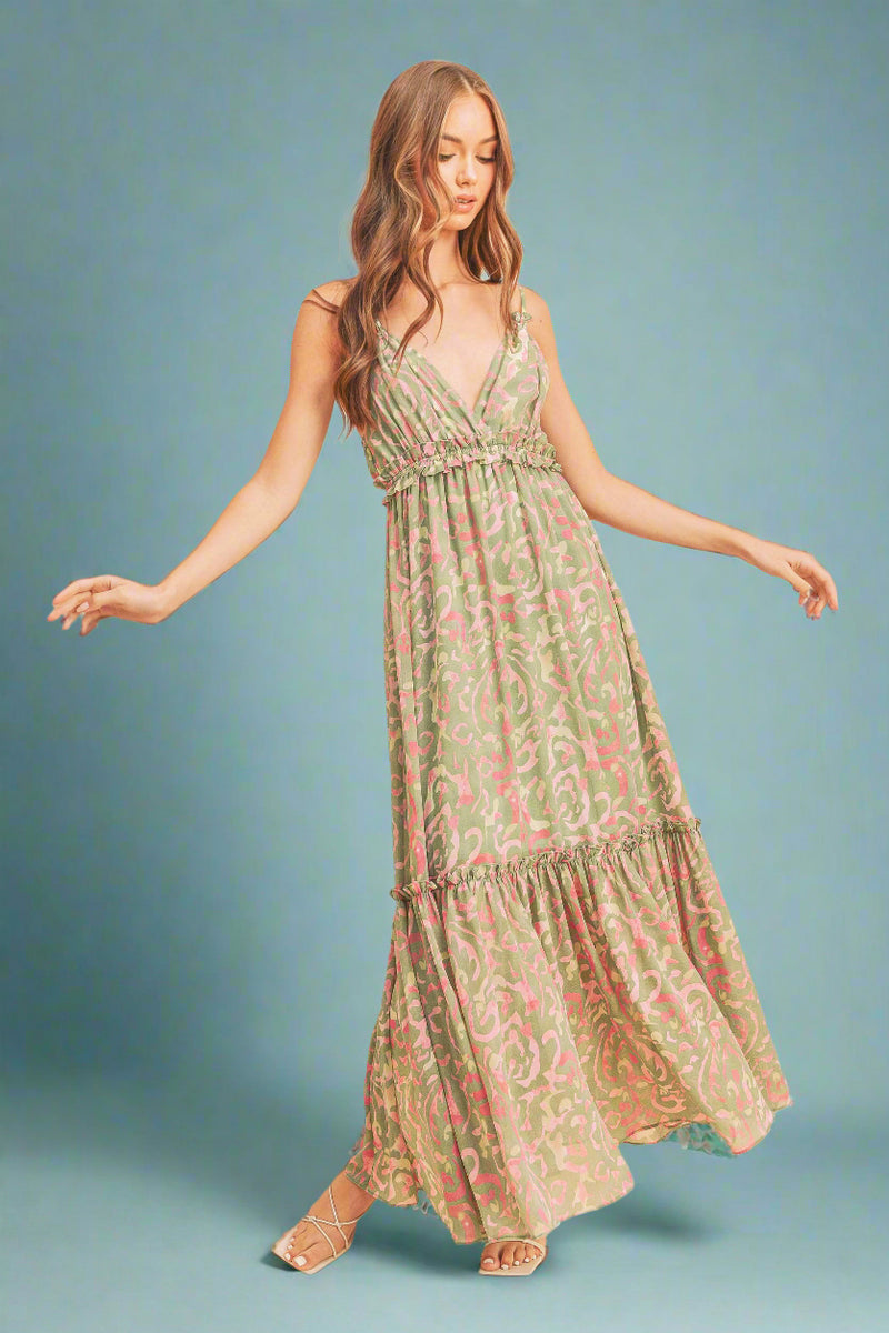 Woman wearing a floral dress against a beige background