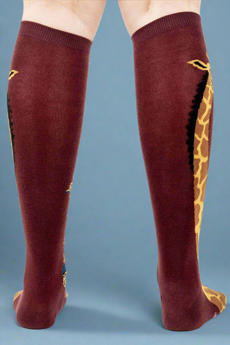 Knee-high socks with giraffe pattern on a white background