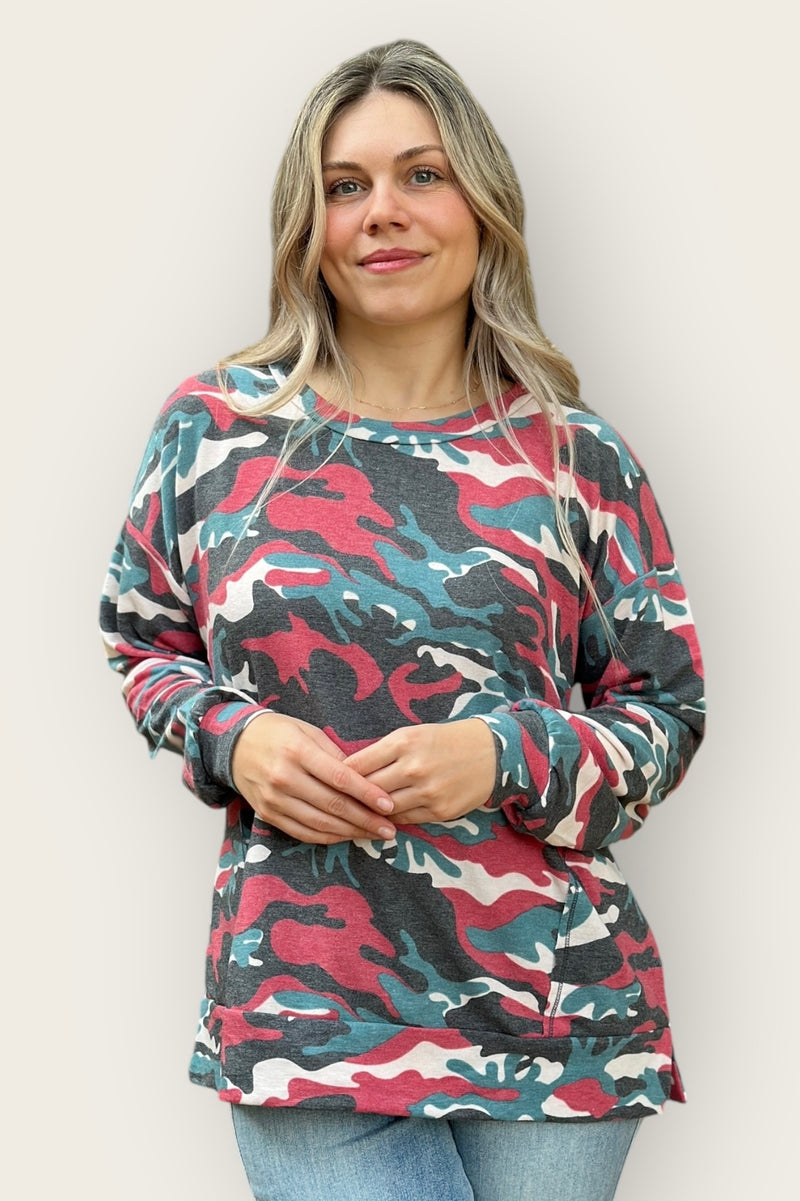 Women’s lightweight long sleeve scoop  neck camouflage top in pink, teal, grey, and cream. Loose, relaxed fit and hip length.