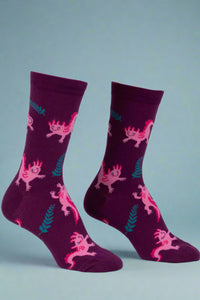 Pair of purple socks with pink character design on a white background