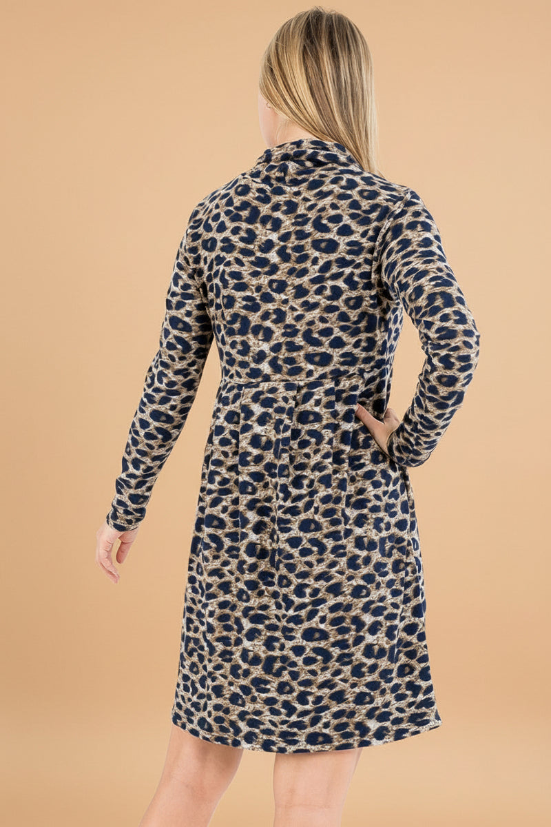 Woman wearing a leopard print dress against a white background