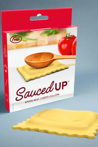 Sauced Up spoon rest packaging with a wooden spoon and ravioli on a white background