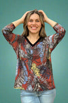 A rust and floral pattern V-Neck 3/4 Sleeve Top. 