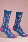 Blue socks with pink seahorse designs on a white background