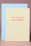 A light yellow card that says “Are you sure we’re related?”