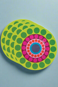 A set of salad plates with brightly colored dot pattern.