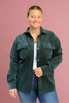 A button up lined corduroy jacket in evergreen. 
