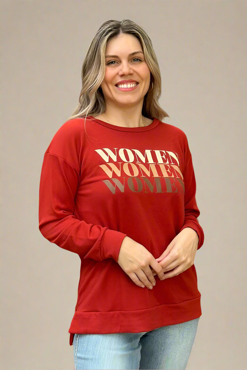 A women’s lightweight pullover crewneck sweatshirt in red with written “Women” graphic on front.
