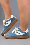 Light blue soccer style sneakers.