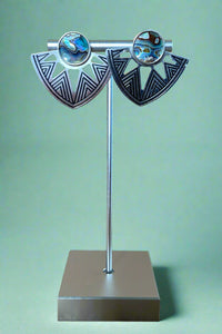 Inverted triangle shaped post earrings with a round abalone shell and unique geometric etchings. 