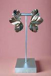 Brushed gold colored flower petal style post earrings. 
