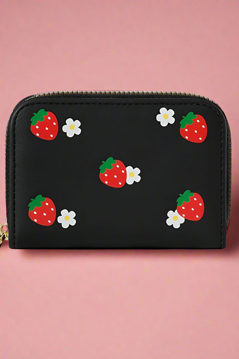 A mini black wallet with a strawberry and daisy design.