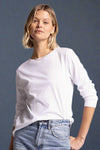 A long sleeve, crew neck in the color White. Made of 100% cotton. 