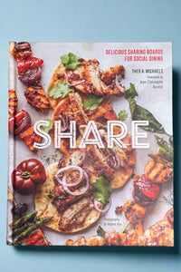 The cover of Share: Delicious Sharing Boards For Social Dining, a cookbook by Theo A. Michaels.