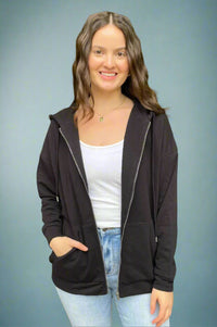 A womens basic relaxed fit zip up sweatshirt with drawstring hood and front pockets in black.