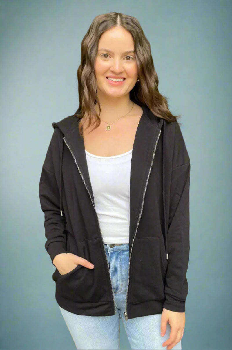 A womens basic relaxed fit zip up sweatshirt with drawstring hood and front pockets in black.