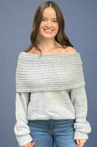 A soft, grey knit sweater with an exaggerated cowl neckline.