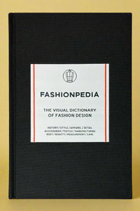 A black hardcover book titled "Fashionpedia".