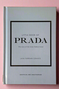 Small baby blue colored hardcover book titled "Little Book of Prada".