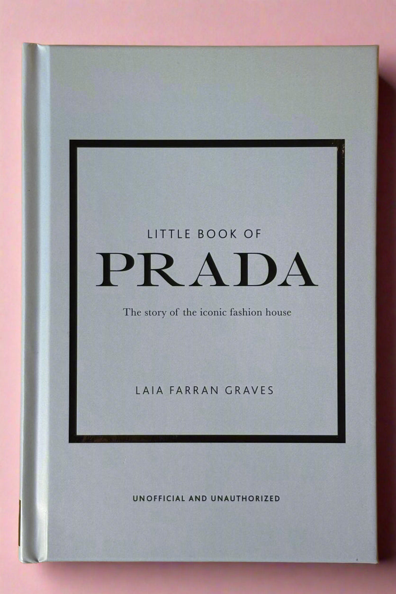 Small baby blue colored hardcover book titled "Little Book of Prada".