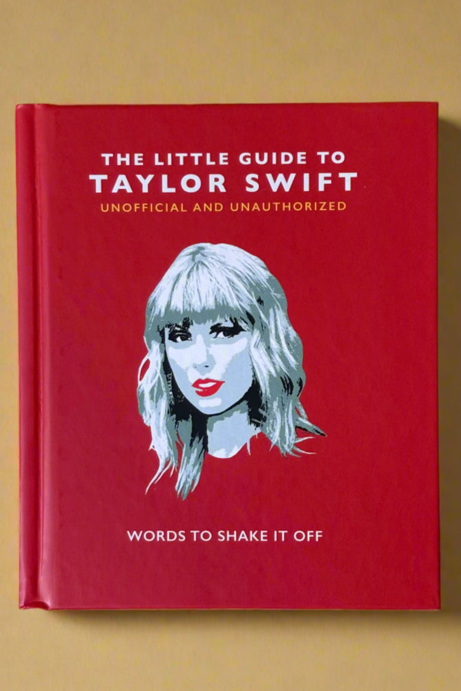 Small red hardcover book titled "The Little Guide to Taylor Swift".