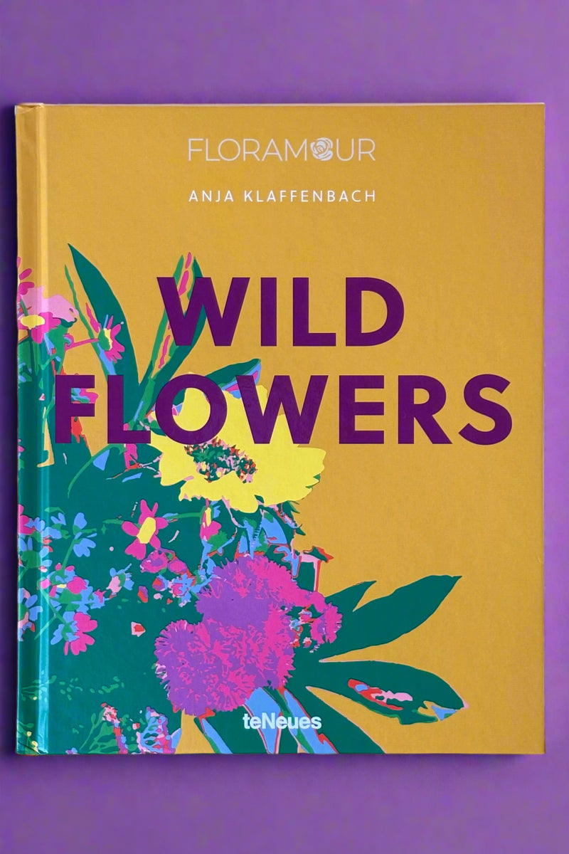 Large hardcover book titled "Wild Flowers".