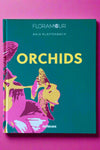 Large hardcover book titled "Orchids".