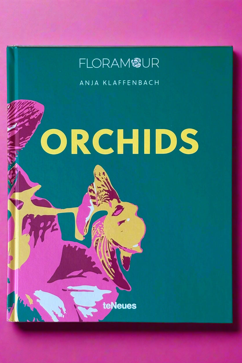 Large hardcover book titled "Orchids".