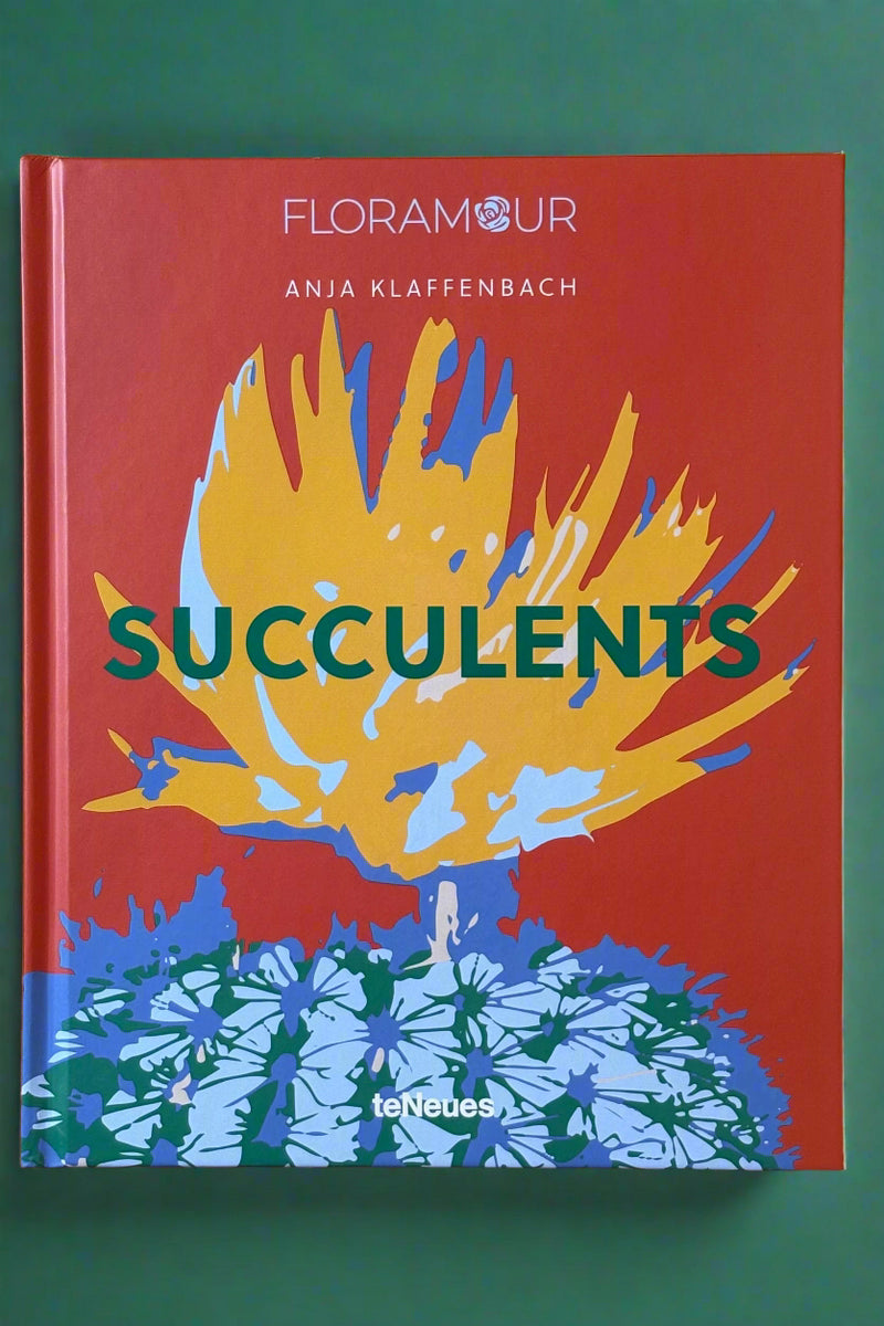 Large hardcover book titled "Succulents".