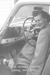 A greeting card with an image of a vintage black and white photo of a woman sitting in an old car with the door open and white text that reads ‘One minute you’re young and free…’