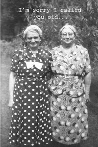 A card with a black and white image of two standing women that says “Im sorry I called you old….”