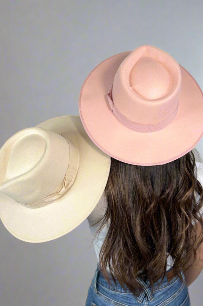 Blush and ivory fedora, wide brim hats with ribbon detailing.