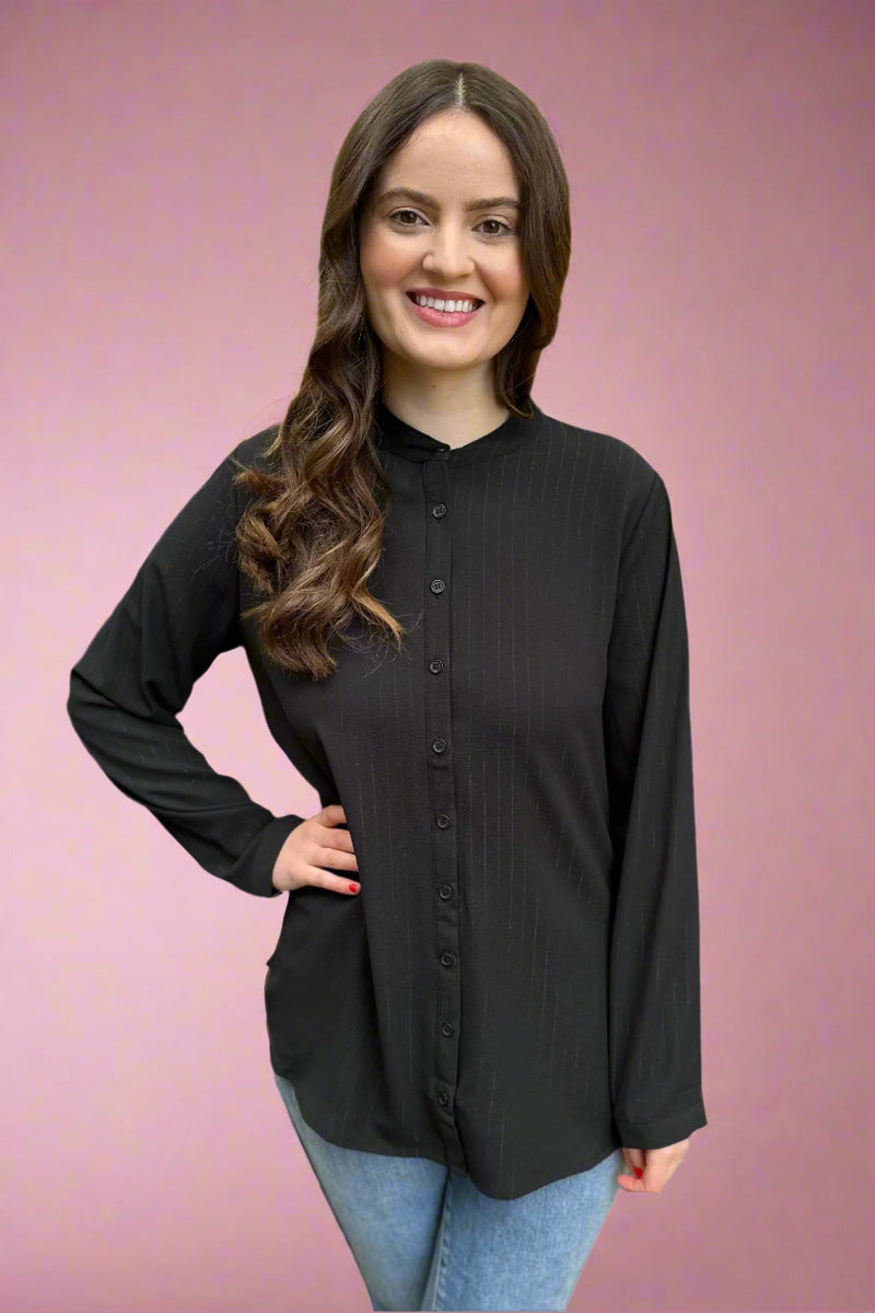 A women’s button down blouse in black featuring long sleeves, a mandarin collar, and subtle shimmer stripes.