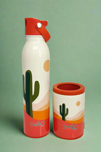 An image of a Swig mug featuring a cactus and desert print on white background. It is insulated, with a stainless steel body and a spill-resistant lid.
