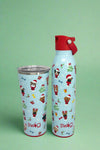 An image of a Swig mugs featuring a dog in Santa hat pattern on a light blue background. It is insulated, with a stainless steel body and a spill-resistant lid.