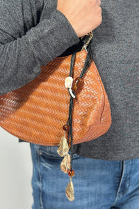 Woven Shoulder Bag With Charm - Brown