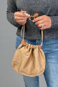 Woven Shoulder Bag With Charm - Brown