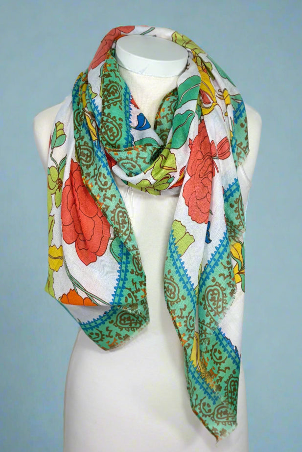 Lightweight summer scarf with rad 70’s floral print and paisley trim detail.