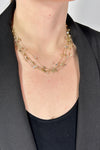Delicate multi strand collar length necklace with dainty beads throughout. 