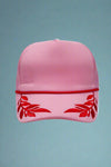 Pink foam trucker hat with fuchsia leaf pattern. Adjustable.