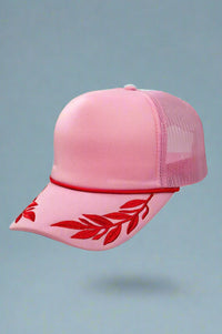 pink foam trucker hat with fuchsia leaf pattern. Adjustable.