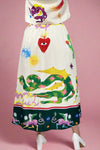 Colorful skirt with artistic designs on a plain background