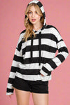 A black and white striped hooded sweatshirt. 