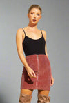This corduroy Zip Up Mini Skirt in the color rust is made with comfy corduroy fabric and chic zip up design. 