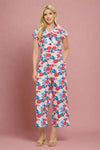 A blue and red floral pattern cropped jumpsuit. It has cap sleeves and a collar. With an elastic waist, side pockets, and a side zipper.