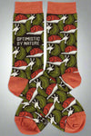 A pair of crew socks with fern leaves and snails on them. It reads ‘optimistic by nature’ on the ankle.
