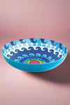 A salad bowl with a blue and white wave pattern on the inside and a solid light blue color on the outside.